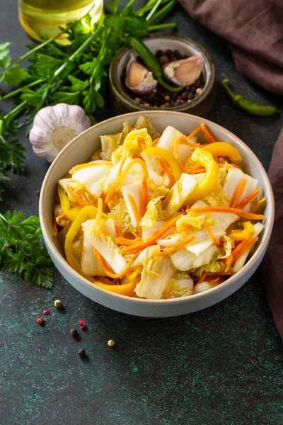 Korean pickle traditional fermented vegetable, Kimchi cabbage on a stone countertop. Copy space.