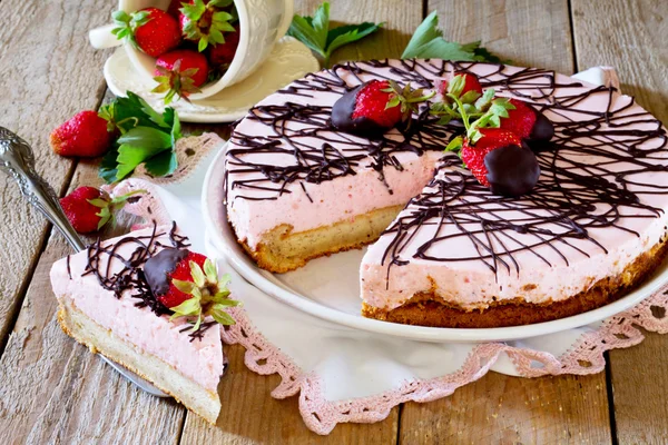 Cake ice cream with strawberries on a wooden table — Stock Photo, Image