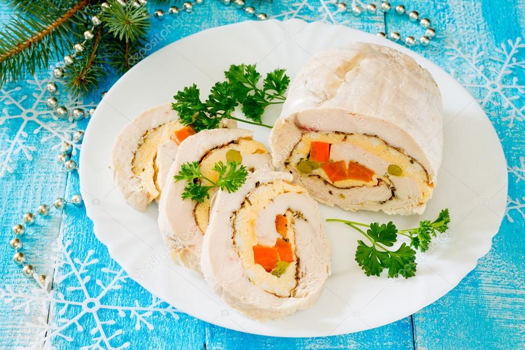 Chicken roll with omelette and vegetables in a New Year's Eve