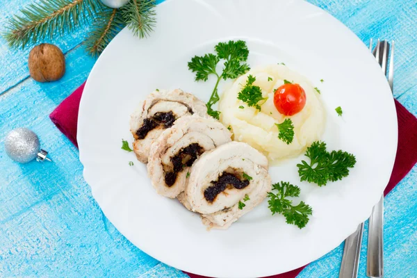 Chicken roll with prunes and nuts in a New Year's Eve — Stock Photo, Image