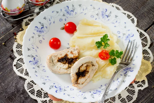 Chicken roll with prunes and nuts in a rustic style — Stock Photo, Image