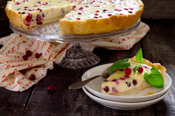 Cakes, pies, shortbread dough with fresh cranberries flood in a — Stock Photo, Image