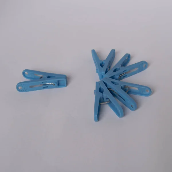 Bright Blue Colored Laundry Plastic Pins Separated Group Alone — Stock Photo, Image