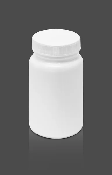 Blank packaging supplement product bottle isolated on gray background — Stock Photo, Image