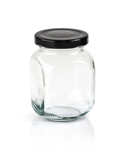 Čiré sklo láhev s černou čepici izolovaných na bílém pozadí — Stock fotografie