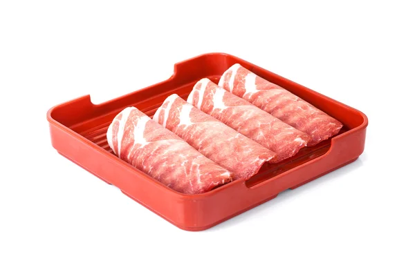 Pork sliced in tray isolated on white background Stock Picture