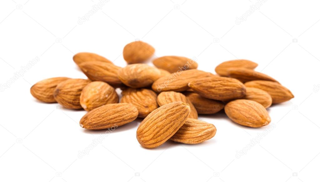 Almond seed on white background