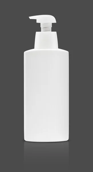 Blank packaging cosmetic pump bottle isolated on gray background — Stock Photo, Image