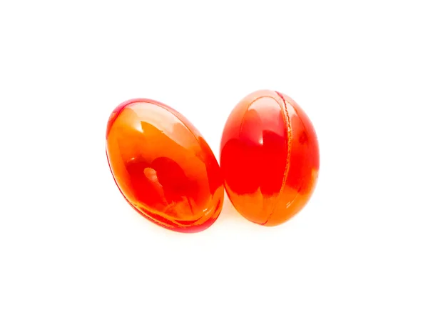 Capsules de supplément rouge isolées sur fond blanc — Photo