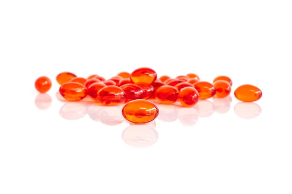 흰색 배경에 고립 된 빨간 보충 캡슐 — 스톡 사진