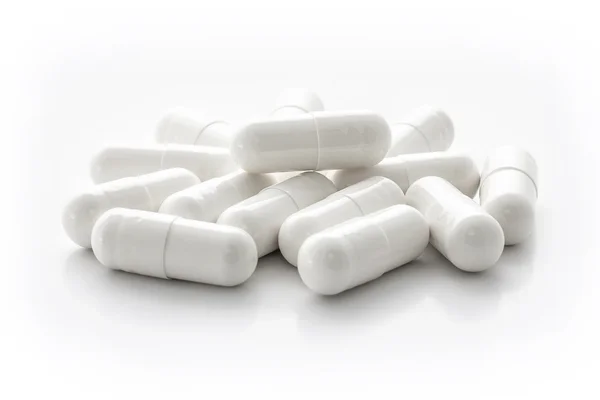 White medicine capsules — Stock Photo, Image