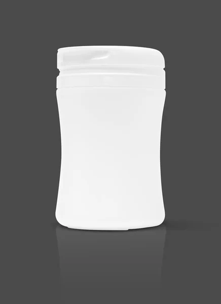 Порожня упаковка додаткової пляшки продукту ізольована на сірому фоні — стокове фото