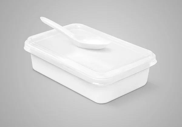 Caja de plástico de embalaje en blanco para alimentos y cuchara de plástico aislada sobre fondo gris —  Fotos de Stock