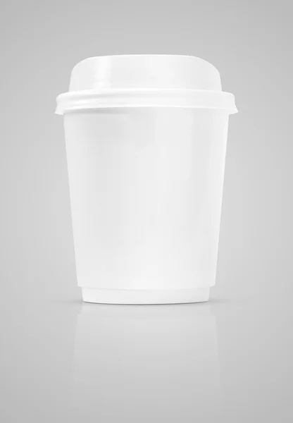 Blank coffee cup to go isolated on gray background — Stock Photo, Image