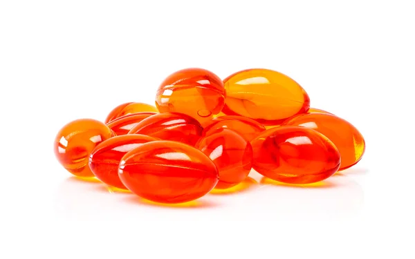 Capsules de supplément rouge isolées sur fond blanc — Photo