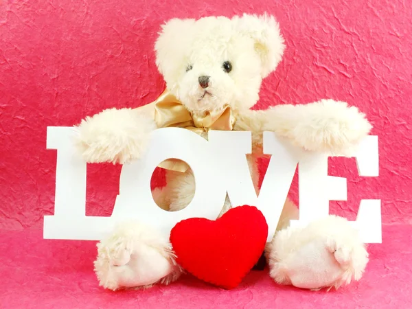 Niedliche Teddybär Konzept Valentinstag auf rosa Hintergrund — Stockfoto