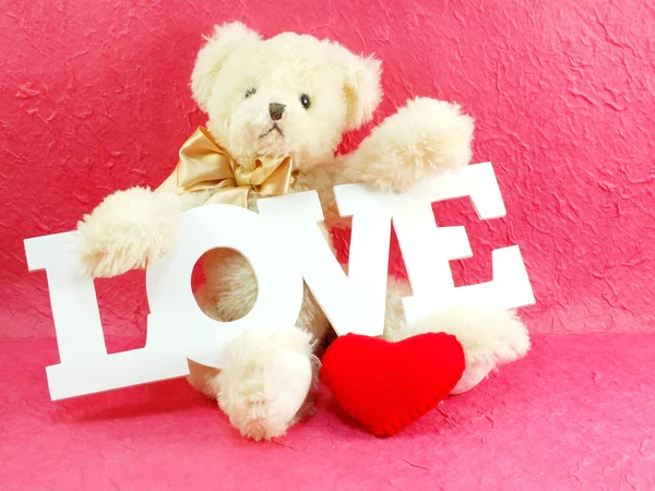 Niedliche Teddybär Konzept Valentinstag auf rosa Hintergrund — Stockfoto