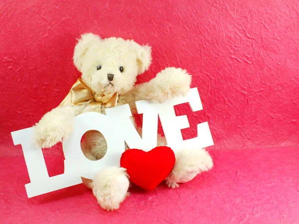 Niedliche Teddybär Konzept Valentinstag auf rosa Hintergrund — Stockfoto