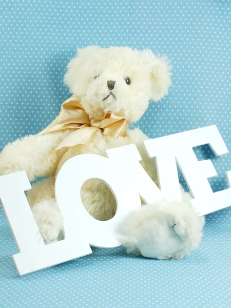Niedliche Teddybär Konzept Valentinstag mit blauem Hintergrund — Stockfoto