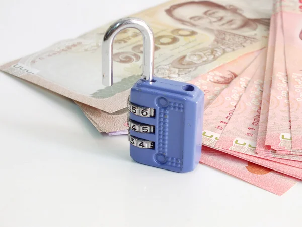 concept of saving money lock on background close up