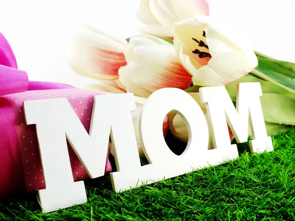 Happy mothers day background with artificial flower with green background — Stock Photo, Image