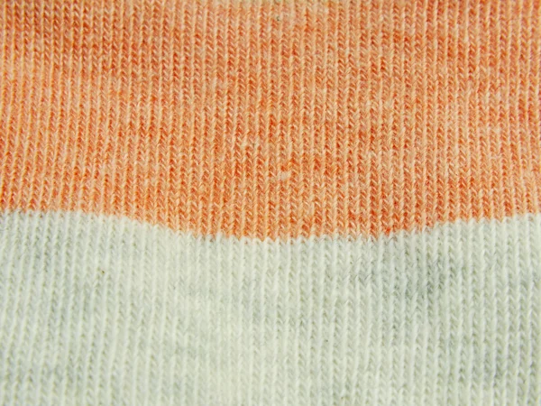 Coloré pastel chaussettes en laine tricotée fond gros plan — Photo
