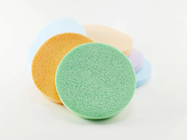 Colorful round facial cleansing sponges isolated on white background — Stock Photo, Image