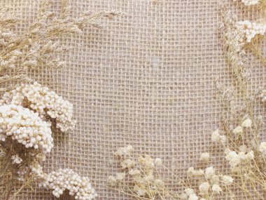 çuval mat kuru çiçek arka plan ve vintage filtre renk ile yapılan kompozisyon ile