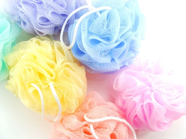 Colorful  plastic bath puff for shower cleaning and scrub body — Stockfoto
