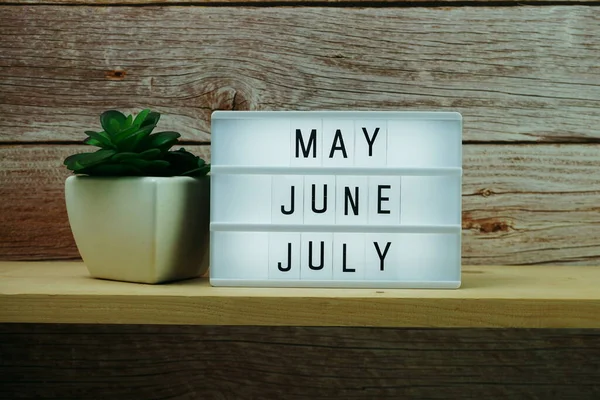 May June July Word Light Box Wooden Background — Stock Photo, Image