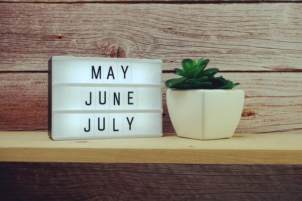 May June July Word Light Box Wooden Background — Stock Photo, Image