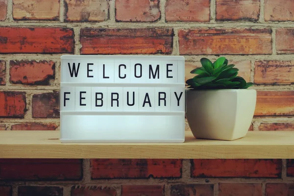 Welcome February Word Light Box Wooden Shelves Background — Stock Photo, Image