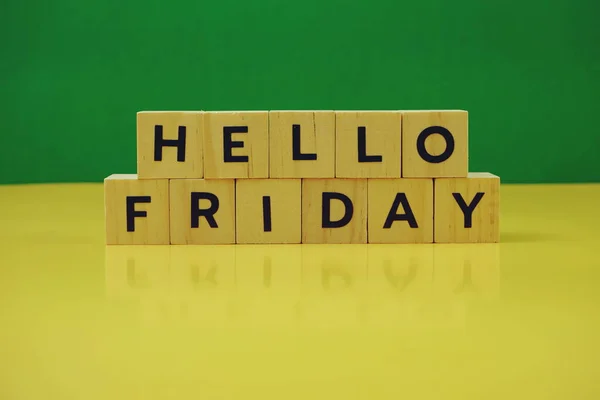 Hello Friday alphabet letter on green and yellow background