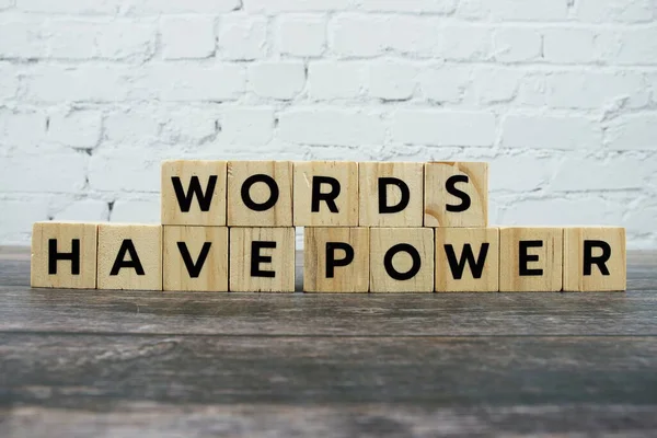 Words Have Power word alphabet letters on wooden background