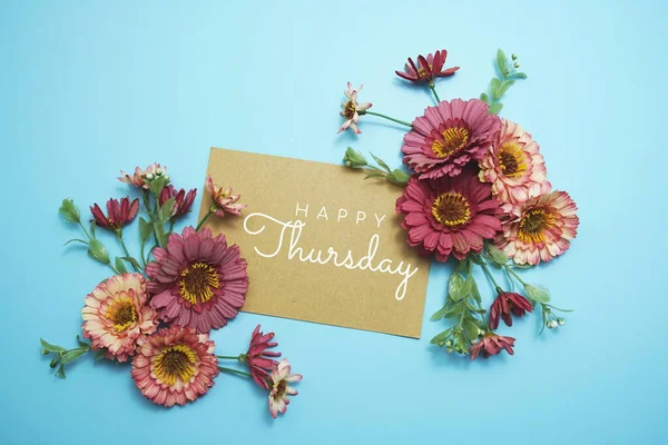 Happy Thursday card typography text with flower bouquet on blue background