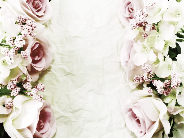 Lindas rosas flor na textura do papel — Fotografia de Stock