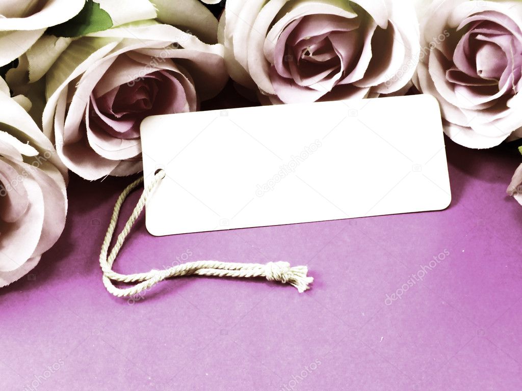 Beautiful roses flower and paper tag
