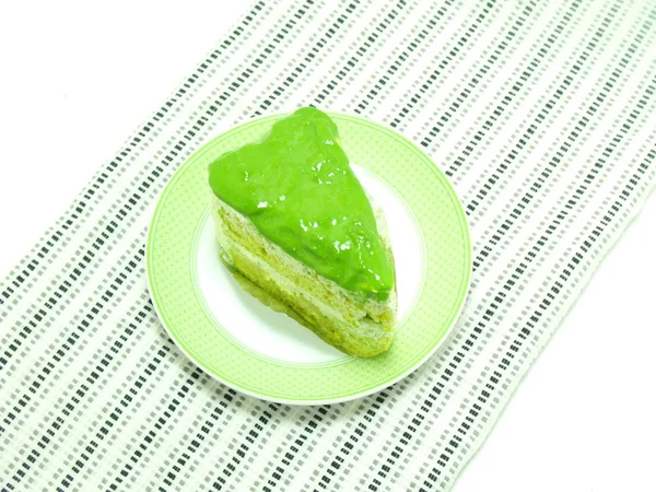 Grüntee-Kuchen auf Tischdecke — Stockfoto