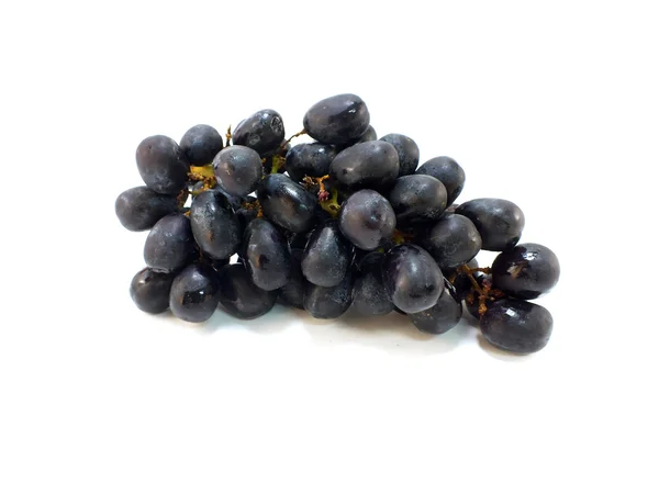 Egy csomó fekete szőlő elszigetelt fehér alapon — Stock Fotó