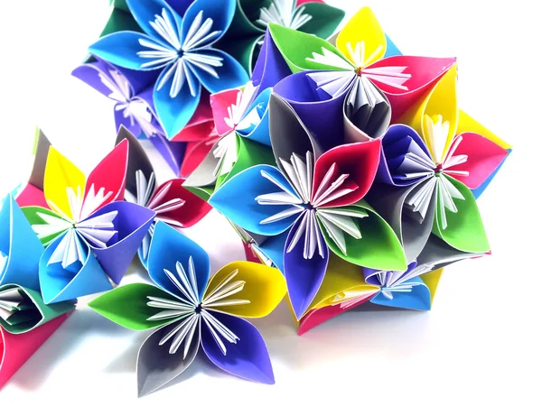 Unidad origami flores aisladas sobre fondo blanco — Foto de Stock