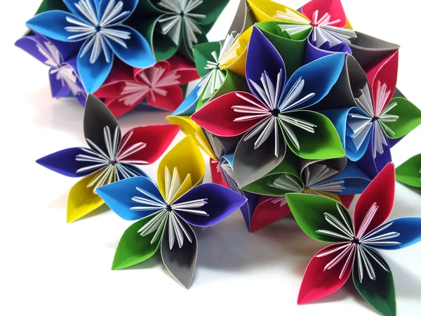 Unidad origami flores aisladas sobre fondo blanco — Foto de Stock