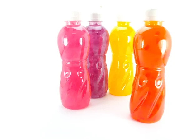 Bottles of juice on a white background — Stock Photo, Image