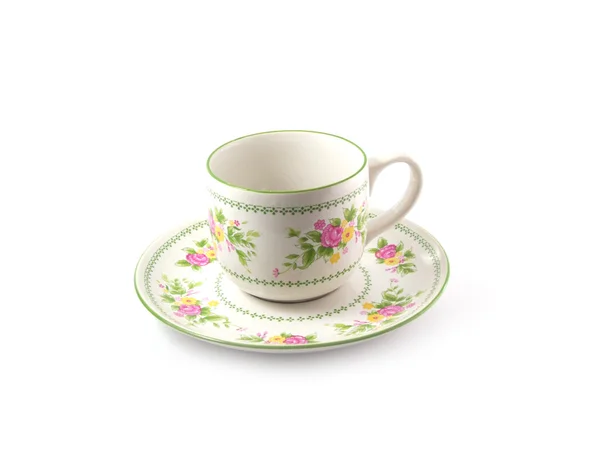 Xícara de chá com tinta de flor no fundo branco — Fotografia de Stock