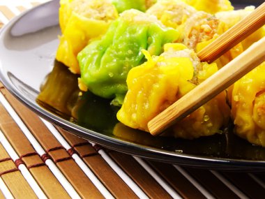 Dim sum kavramı pişirme akışı dim sum Çin yemeği kadar kapatın