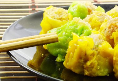 Dim sum kavramı pişirme akışı dim sum Çin yemeği kadar kapatın