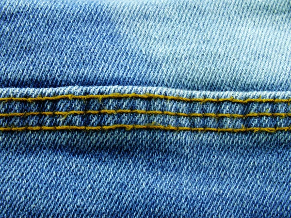 Blauwe denim jeans textuur achtergrond — Stockfoto