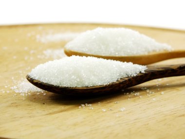 Bir tahta kaşık seçici odak şeker