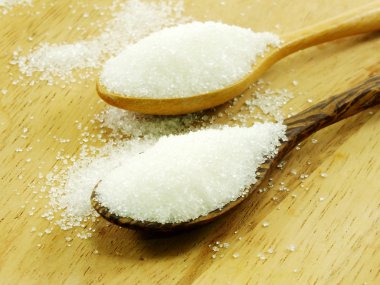 Bir tahta kaşık seçici odak şeker