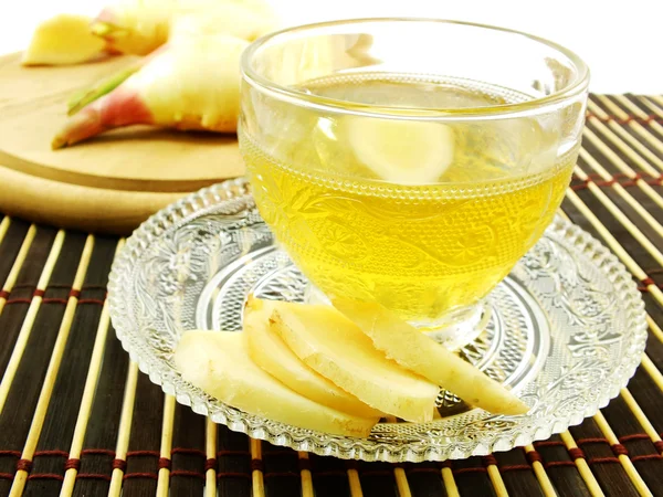 Delicious healthy ginger tea in transparent tea cup — Stock Photo, Image