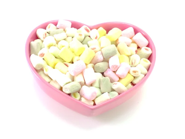 Un sacco di piccoli marshmallow su sfondo bianco — Foto Stock